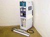 Bettcher chemical dispensing cabinet three-quarter front-left view showing control panel, pump compartment, and chemical storage bay