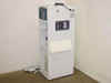 Bettcher chemical dispensing cabinet right-side view showing closed door with viewport window and multi-port dispense nozzle tray