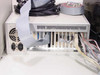 Lotus Technologies 7000 rackmount computer – rear view showing expansion card slots, ribbon cables, IEC power inlet, and cooling fan