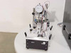 Lotus Technologies 7100 CSS tester module – single unit removed from enclosure showing dial indicator, 3-axis micro-gaging assembly, pneumatic components, and wiring