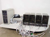 Lotus Technologies 7100 CSS system – full system laid out showing 7000 tower controller (left), rackmount computer (center), and all 4 CSS tester modules (right) with full cable runs