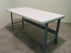 Edsal M5331 72x30 industrial workbench — three-quarter angle view showing full frame and laminate work surface