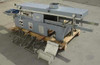 Technical Devices Mark I-C wave soldering machine – full front/side view on pallet with conveyor rails, exhaust hood on top, and flux tray at front