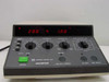 Olympus PM-CBAD Exposure Control Unit – close-up of front panel controls including LED readout, rotary knobs for ASA and reciprocity, Film End indicator, AE Lock and Time Recall buttons, and Time Off/Winding control