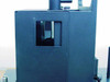 Applied Magnetics EL97083713 — close-up of single alignment module aperture showing internal mirror/prism element and fine adjustment hardware