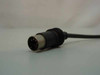 IBM 1503206 PC XT keyboard — close-up of 5-pin DIN male connector at end of coiled cable