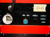 Lower connector panel detail showing locking 20A 120/208V power inlet, duplex AC outlet, IL-1, IL-2, RS-ADP, NCV, HRT-1 circular connector, CLO-1, OCV, and TC-1 DB-style ports