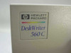HP Hewlett Packard DeskWriter 560C branding label close-up on top of printer housing