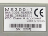 Unitech MS300-1 label showing model, Bar Code Reader designation, FCC Class A, CE mark, Made in Taiwan, and serial number