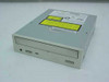 Hitachi GD-7000 8x IDE DVD-ROM drive front view showing beige faceplate, tray slot, and yellow DVD-ROM label sticker