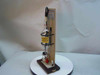 SKC 302 Personal Sampler Calibrator side view — bubble meter assembly with graduated glass tube and rubber bulb on wooden stand