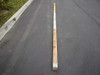US Military 17ft tent ridge pole male section on pavement showing full length and metal end cap