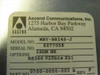 Ascend Communications label showing Model No. MBV-BRI4S-J, Serial No. 6077058, Options: ISDN NX RS366 V25bis X21, Part No. 0700-0050-003 Rev F