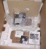 HP NetServer LC 2000 D8514A — original HP box open showing tower server in foam packaging with manuals, warranty booklet, and installation software