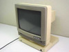 TeleVideo 955 serial terminal — front three-quarter view showing CRT display and TeleVideo logo badge on beige housing