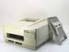 HP 33449A LaserJet III laser printer — front three-quarter view showing output tray open and paper input tray removed and placed to the right