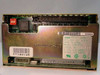 Exabyte EXB-8200 8mm SCSI tape drive — bottom/rear view showing SCSI interface PCB, rating label reading 5 VDC 2.8A and 12 VDC 0.4A, and SCSI connector