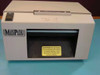 Microcom M-410 8 MedPlus thermal barcode label printer — front view showing MedPlus logo, paper output slot, and printhead caution label