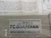 PC Guardian / Micro Security Devices label on packaging — shows brand name, phone numbers, and address
