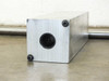 End view of aluminum bearing block showing Diamond Case SU16 linear bearing bore and four corner mounting bolt holes