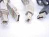 Close-up of USB Type A male and USB Type B male connectors on unbranded USB A to B cables
