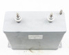 TOEI O82130 capacitor – top-down view showing two main terminals, label, and gray steel enclosure top surface