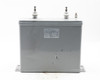 TOEI O82130 high voltage capacitor – front view showing gray steel tank body and white label with specifications