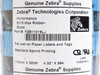 Zebra 5319 wax ribbon label closeup showing FZB11019LJ part number, Black, 110mm x 300M, for paper labels and tags, standard speed printing, lot 912041912
