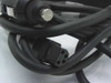 Close-up of cable connectors: cigarette lighter plug end and multi-pin DC laptop connector