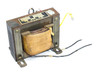 Burton 15180 AC transformer — side/rear three-quarter view showing laminated core, coil winding, and mounting feet