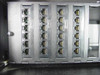 Avaya BI02E1 patch panel modules – front-facing view of four modules showing rows of 4-pin RJ-style jacks with Avaya branding on each module