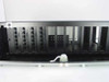 Avaya BI02E1 rack enclosure – side profile view showing front-panel jack rows, rack rails, and locking latch hardware