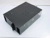 Avaya BI02E1 4-pin patch panel rack enclosure – top-front angled view showing black sheet-metal housing with ventilation slots and rack ears
