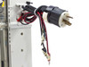 Close-up of NEMA twist-lock plug and flying lead test probe wires on solar panel load tester enclosure