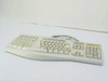 Microsoft F-21K Soft Key ergonomic keyboard — top-left angled view showing split key layout and PS/2 cable