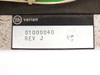 Varian label on chassis reading '01000040 REV J' with Varian logo