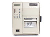 SATO M-8400 Industrial Barcode Label Printer full front view showing overall cosmetic condition with surface wear and SATO logo badge