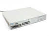Nortel Networks BayStack 450-12T switch front 3/4 view showing 12 RJ45 ports, 400-2FX MDA fiber module, and DB9 console port
