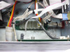 Hughes WD-12778 internal wiring detail showing power wiring harness, terminal block, and interconnect cables