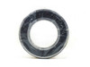 Fafnir 211NPP rubber-sealed deep groove ball bearing face-on view, still sealed in plastic wrap showing inner and outer races