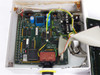 Netstal Sycap 110.240.9335 Komplett Mainboard – close-up interior view showing PCB with ICs, capacitors, transformer, and CE-marked components