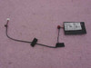 Askey V1456VQL-P1 internal laptop modem board with attached black cable and white 2-pin connector, laid flat