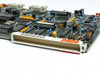 Netstal SLA Bitbus Interface Board – bottom edge showing large multi-pin card-edge connector and orange asset tag