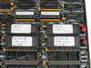 Netstal MEM2 board close-up of EPROM sockets with labels MEM2-17-3.1, MEM2-16-3.0, PAC.EVN 13.5.4, PAC.ODD 13.5.4, DVD_F60 EVN and ODD D-DAT 1.1.2 dated 25.10.96