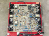 Volkmann AD-1 drive board 20001BBG1M1021 close-up overhead view showing main PCB with transformers, capacitors, power transistors, and terminal blocks on red panel
