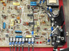 Volkmann AD-1 drive board PCB detail showing IC components, capacitors, resistors, terminal block TB1 with F, STOP, RUN, STOP-TRIP labels, and blue multi-conductor wiring harness