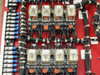 Volkmann drive control panel – close-up of eight Eagle Signal 17P4C AC120V relays labeled K3–K6 and K11–K14 mounted on DIN rail with orange wiring and terminal blocks