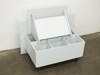 Side-angled view of plastic acid bath with lid propped open – handle cutout and interior sections visible
