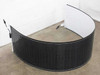 SoloPower SP1-70 flexible CIGS solar panel curved and standing upright showing full flexible length and MC4 cable leads