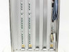 Zycad XP-140 card cage detail showing two SM boards with BUSY, XMIT, RECV, IBUS SEL, LOAD, DUMP, IREC, DMCD, TA, EVAL, CONV LED indicators and CBUSIB board with READY and ERROR LEDs